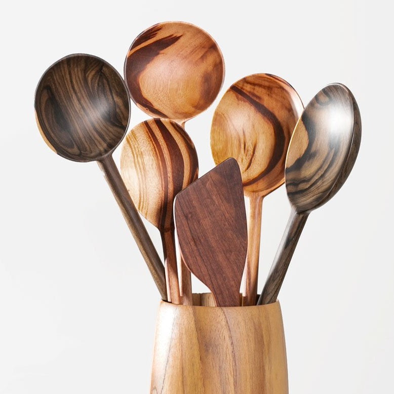 exotic wood spoons in vase